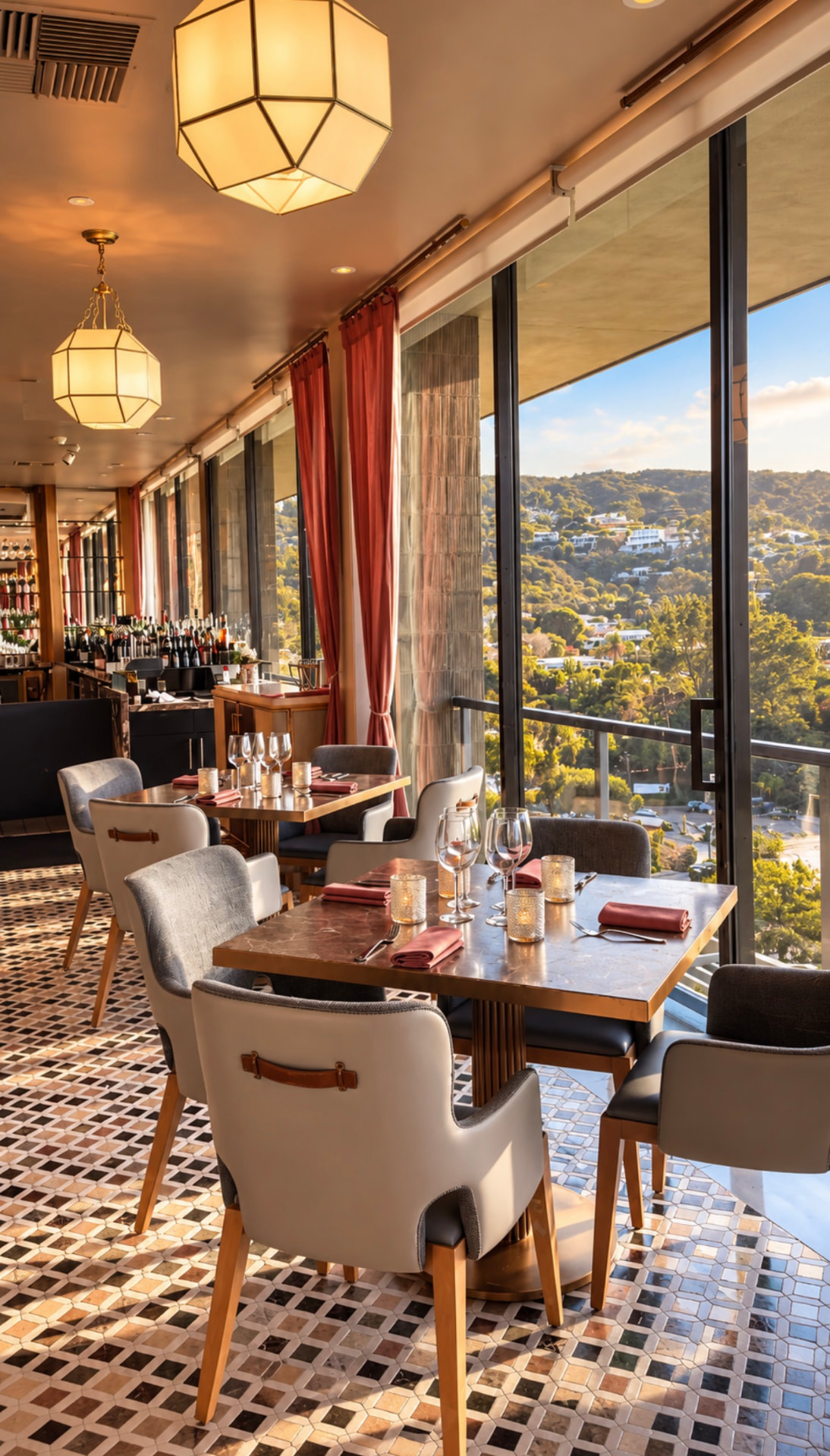 Aries dining room with lantern lights, red drapery and sunlit views over La Jolla